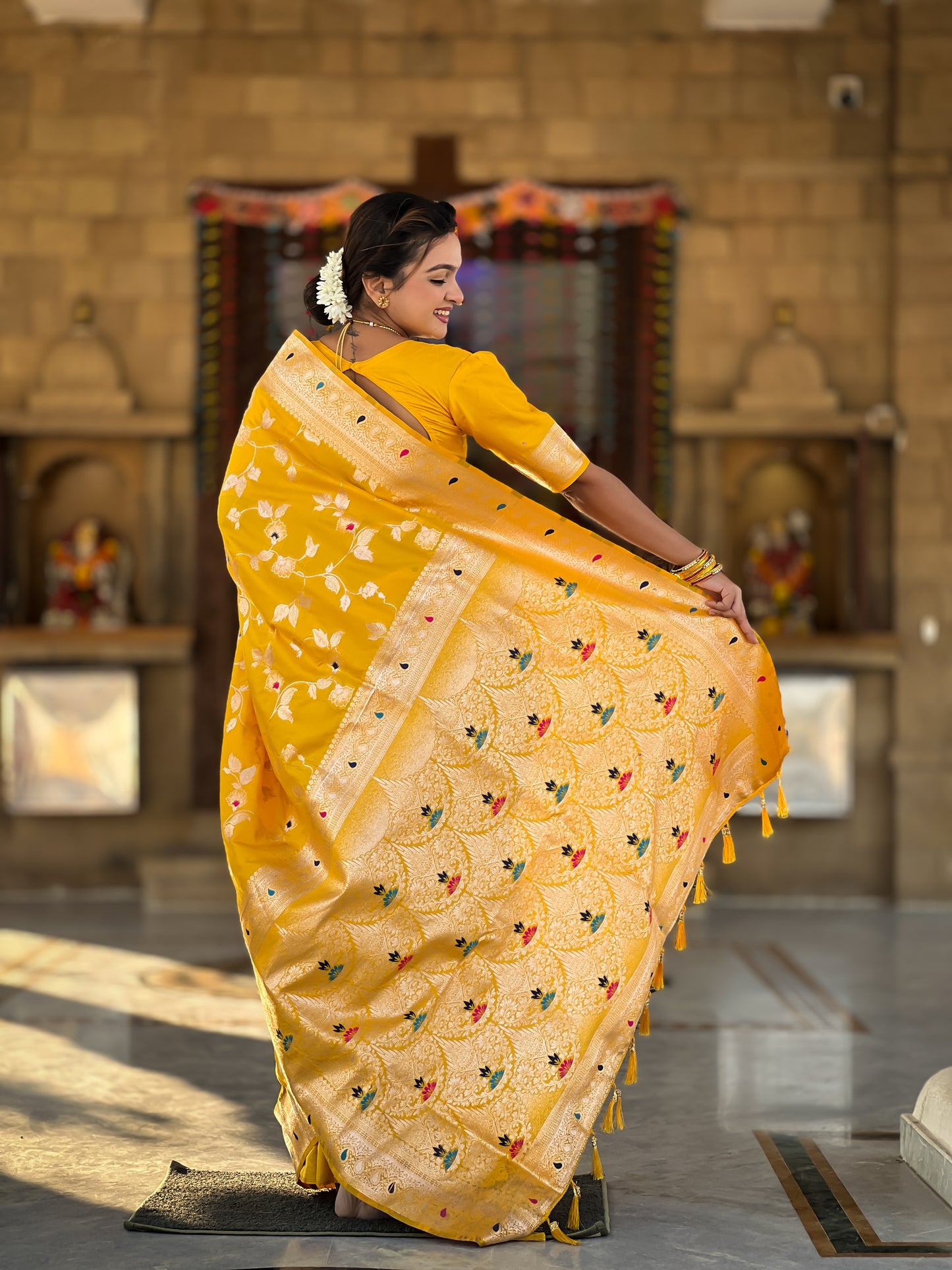 Yellow Banarasi Silk Saree with Intricate Zari Work