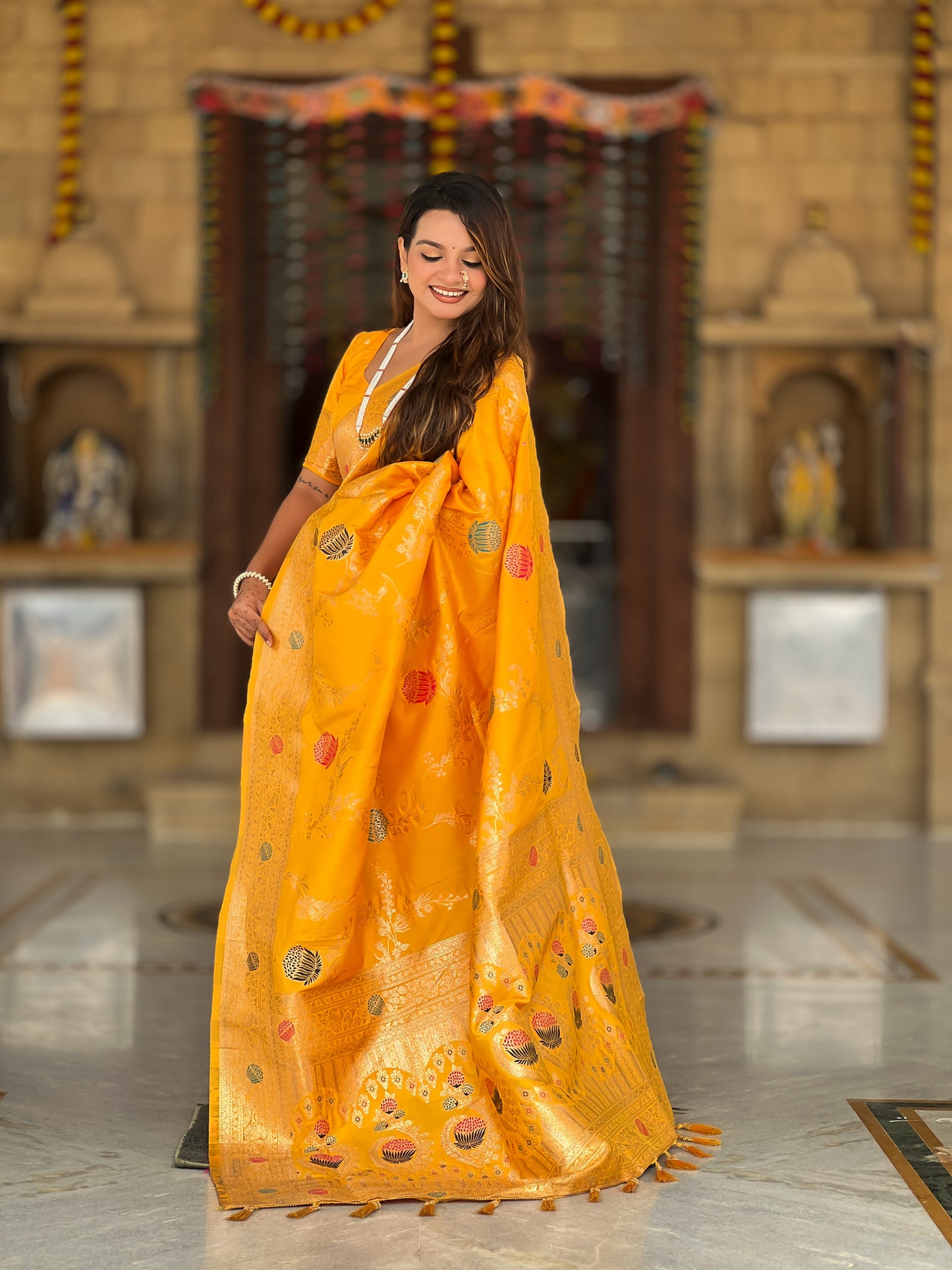 Yellow Banarasi Silk Saree with Intricate Zari Work